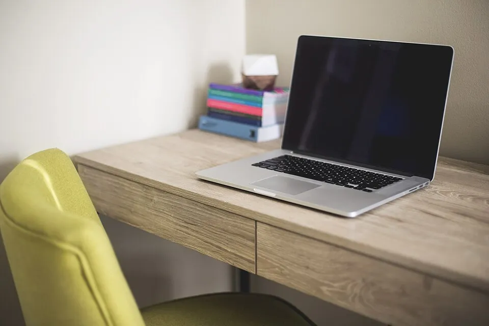 Laptop and books (Unsplash).jpg
