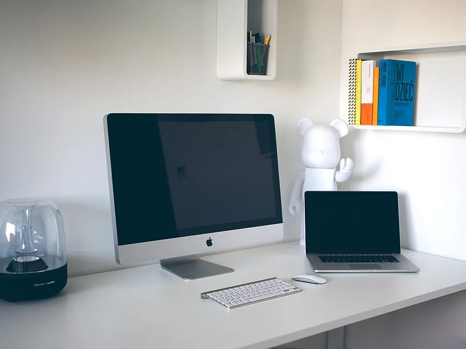 An office table and computers (Unsplash).jpg