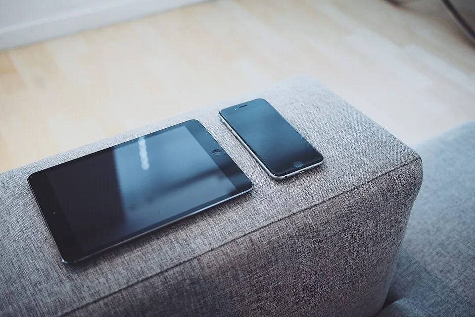 Mobile technology on a sofa (Unsplash).jpg