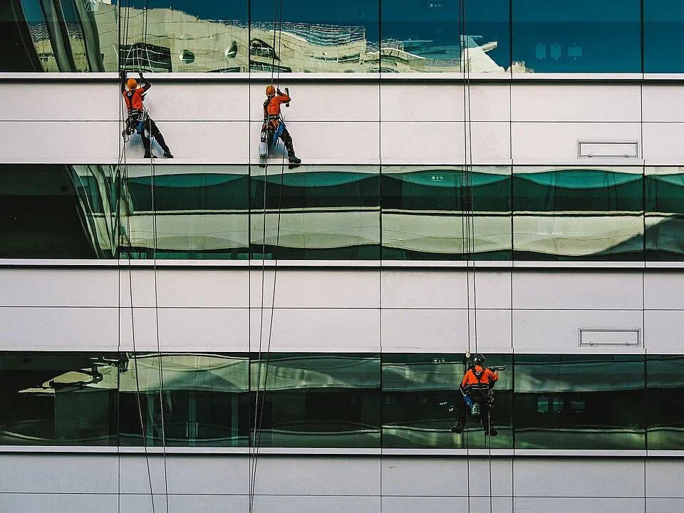 Window cleaners in lisboa (Unsplash).jpg